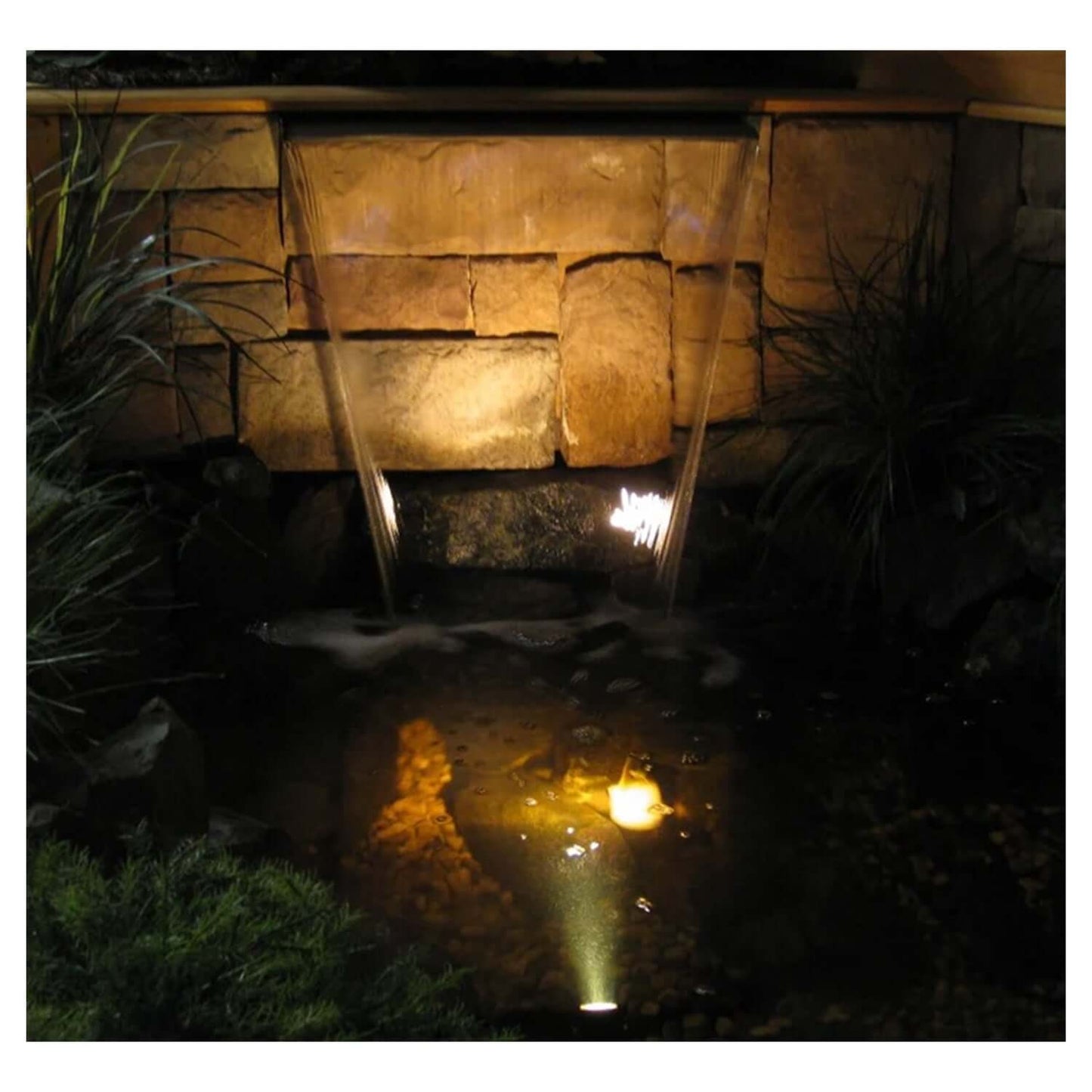2 LED Lights 3 Watt Kit w/ Transformer illuminating outdoor pond waterfall with warm white submersible LED lights