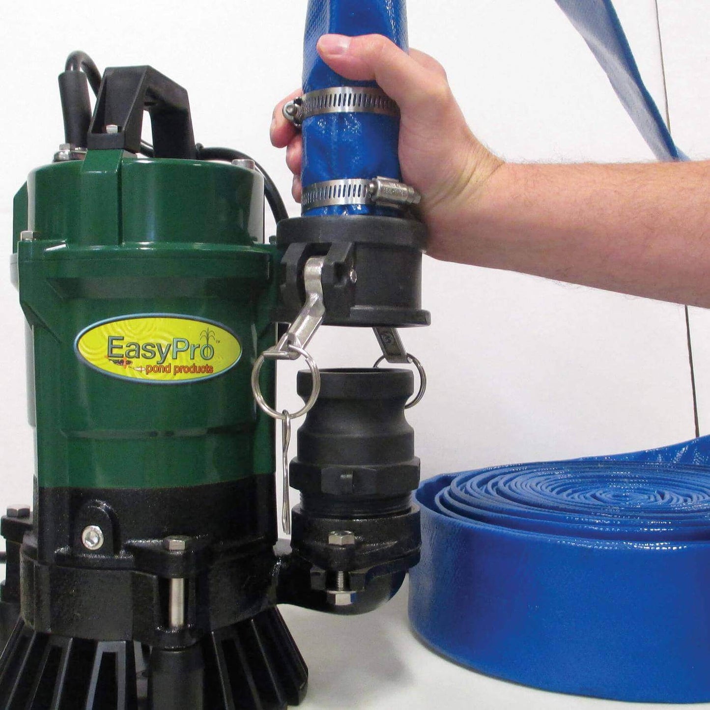 Easypro Cleanout Package with 25FT or 50FT Roll-Up Hose and Quick Connect Fittings connected to pump with roll-up hose