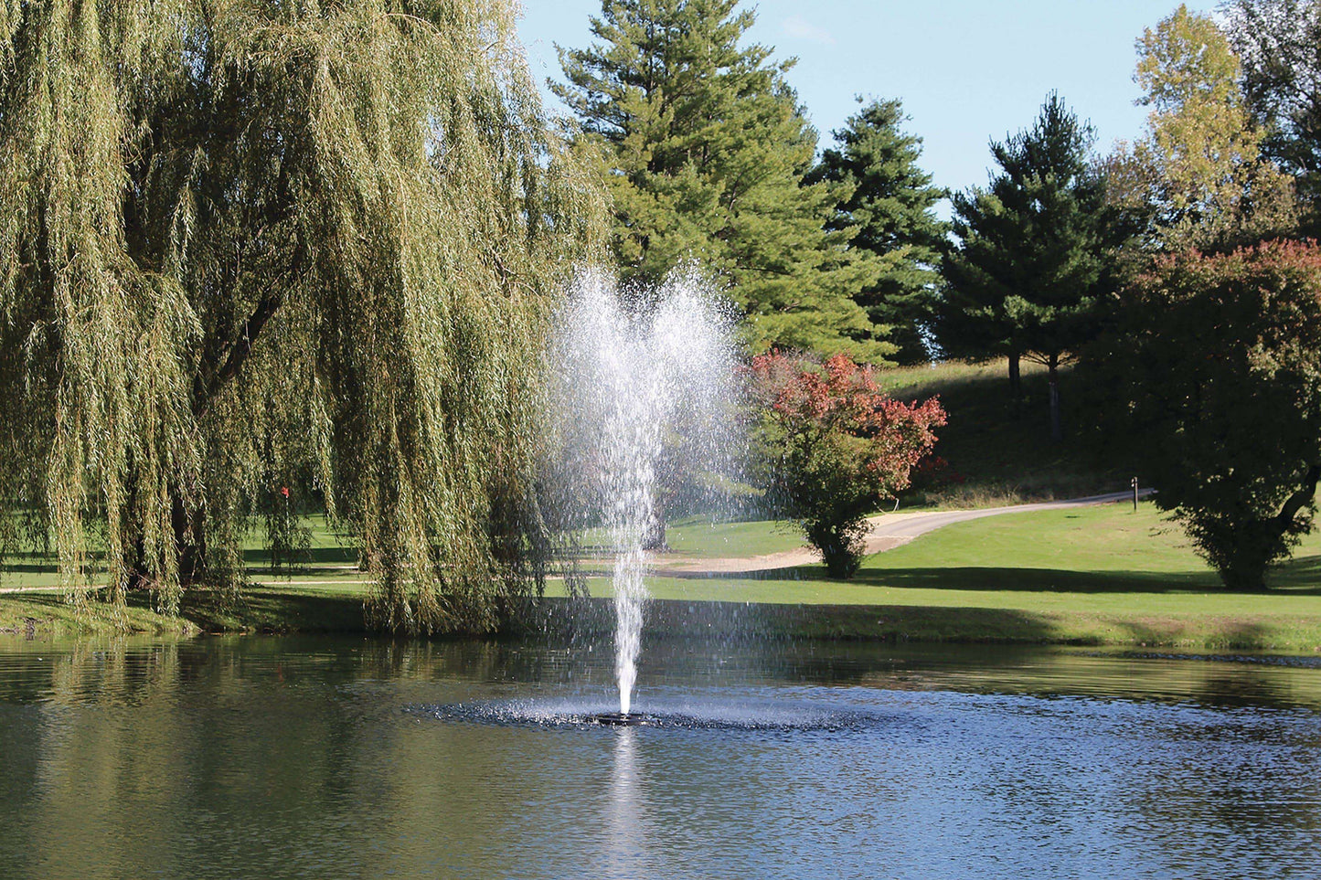 Kasco 4400JF 1 HP Decorative Pond Fountain - 115V spraying tall geyser display in park pond