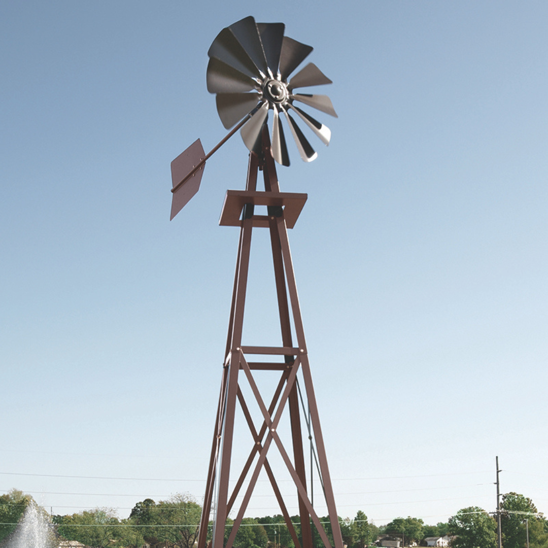 Close-up view of the Galvanized Backyard Ornamental Windmill - 8' featuring the 27-inch windmill head and red powder-coated tips.
