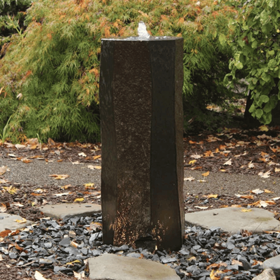 polished sides basalt column outdoor water feature, polished basalt fountain column with saw-cut sides in garden