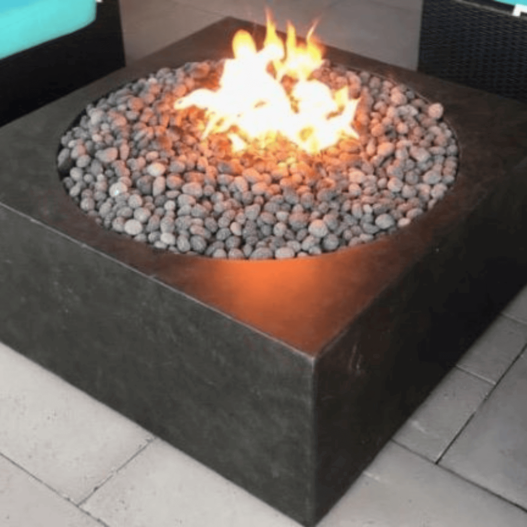 Fire Cube 36 inch GFRC fire pit with modern square design, smooth concrete finish, lava rock media, and bright outdoor flame