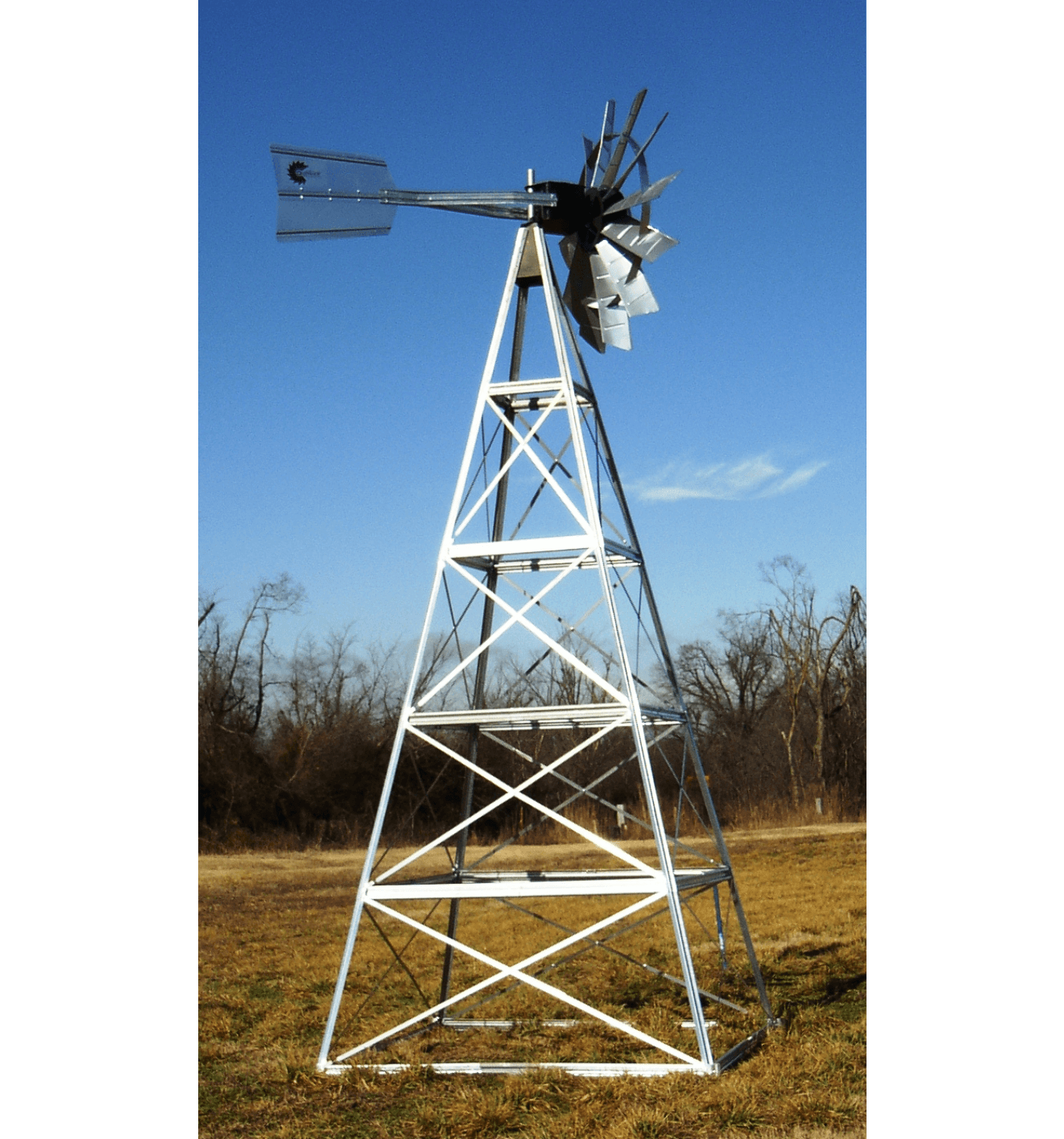 4 leg windmill pond aerator kit installed windmill aeration system on metal tower in field under blue sky