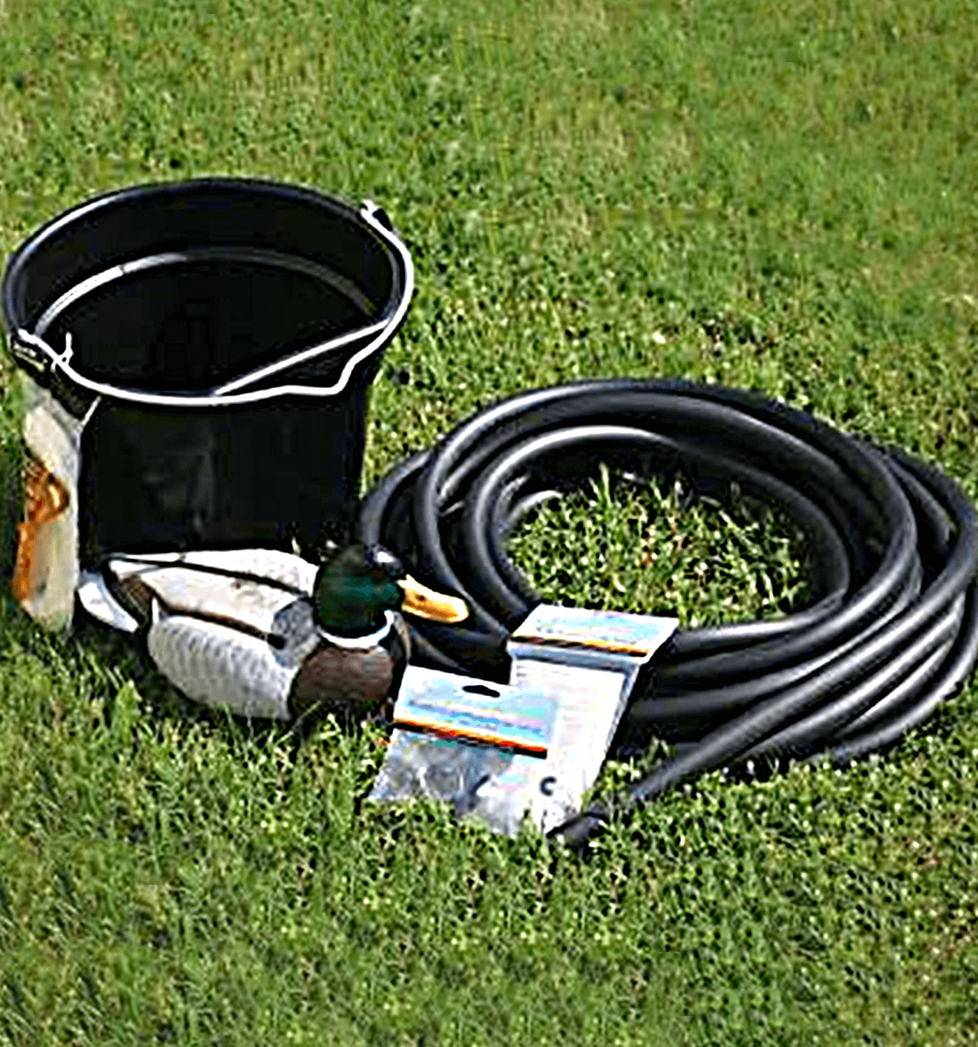 deluxe accessory kit for powder coated windmills with weighted airline tubing, bucket, and pond aeration parts on grass