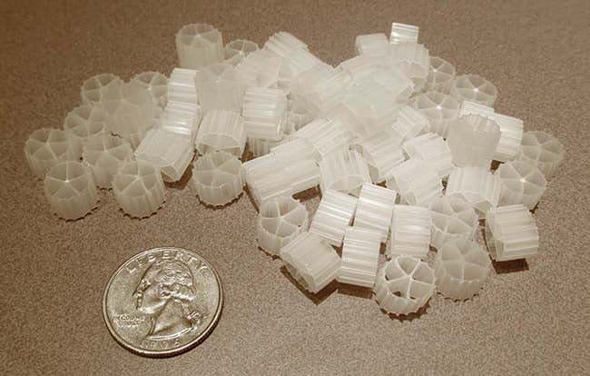 EasyPro Ultimate Tube Media 25 cubic feet pond filter bio media showing plastic tube pieces for beneficial bacteria colonization