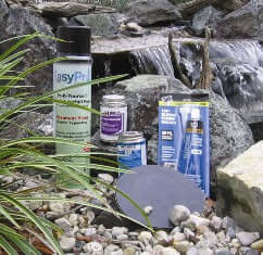 small waterfall installation kit products for pond waterfall repair with sealant, primer, and adhesive beside rocks and water feature