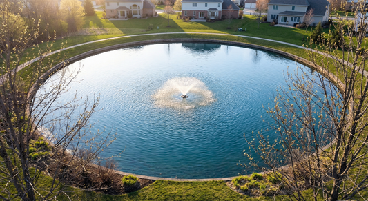 Spring pond with aerating fountain - seasonal startup checklist