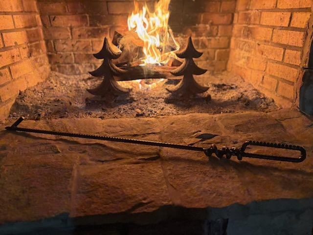 Detail view of the Good Works Hand Twisted Fire Poker highlighting its sturdy construction and versatile use for campfires and fireplaces.