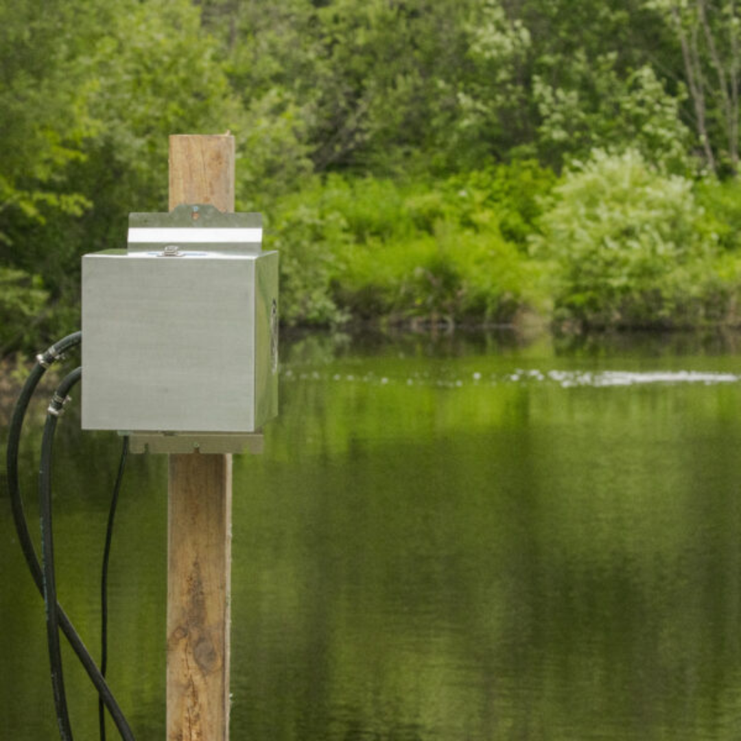 User-friendly installation of Kasco Home Series Diffused Aeration Systems, featuring components and tubing layout for optimal aeration in small ponds.
