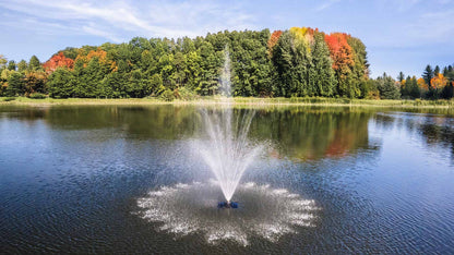 Scott Aerator Solar Amherst pond fountain spraying tall central jet with wide surface pattern in lake, daytime circulation display
