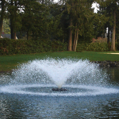 Otterbine Saturn floating aerating fountain with low wide umbrella spray installed on a pond